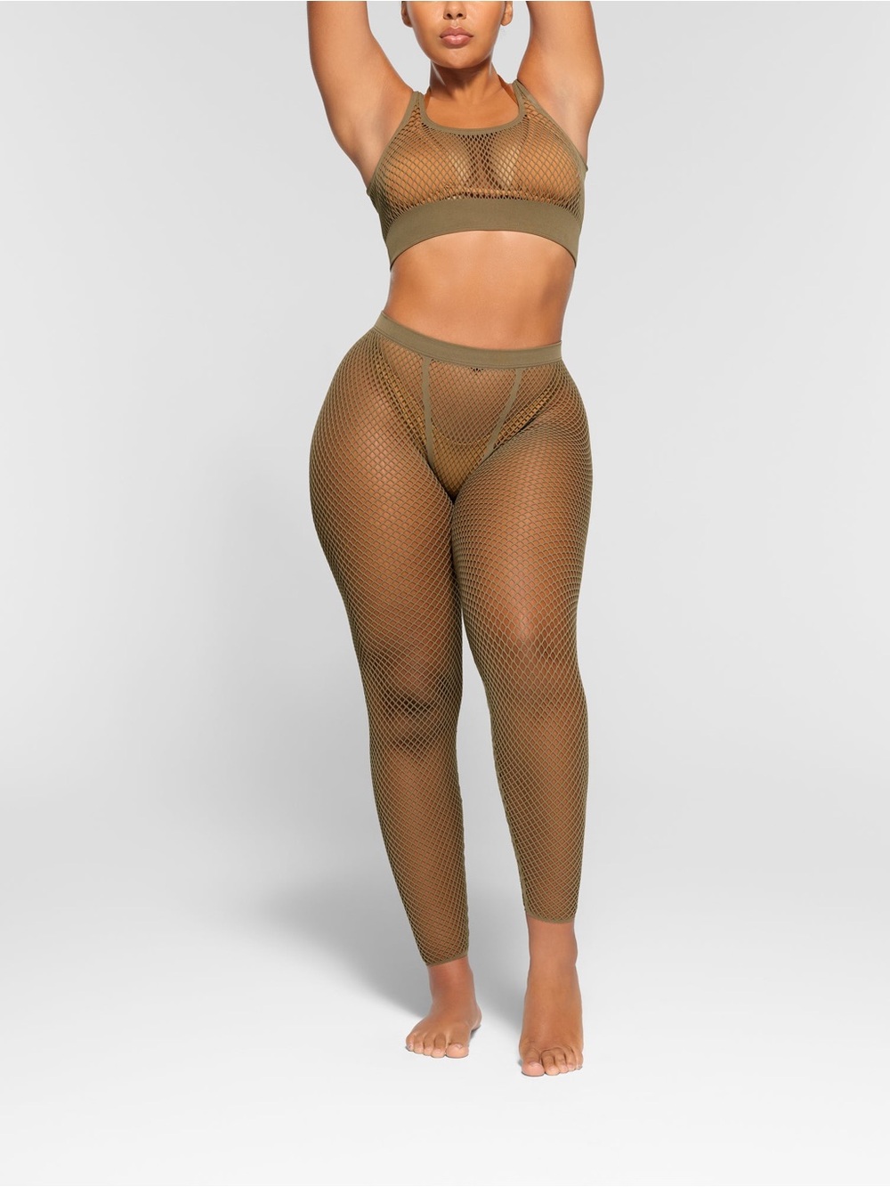 SKIMS recycled swim army warp knit leggings and recycled swim jasper bra set